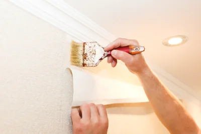 Pose de papier peint à Longwé — revêtements muraux et toiles de verre